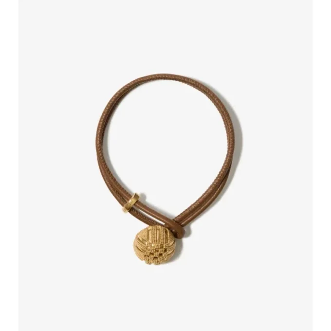 Armband i läder med rutmönster Armband i läder med rutmönster