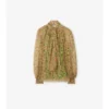 Blus i siden med små blommönster Blus i siden med små blommönster