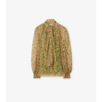 Blus i siden med små blommönster