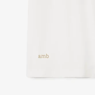 Bomullspikétröja med logotyp i kragen