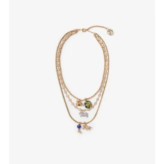 Halsband med tre lager och berlocker Halsband med tre lager och berlocker