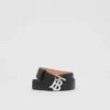 Läderskärp med monogrammotiv Läderskärp med monogrammotiv