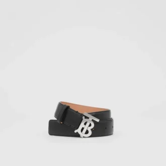 Läderskärp med monogrammotiv