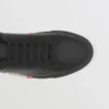 Lädersneakers med randiga detaljer Lädersneakers med randiga detaljer