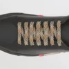 Lädersneakers med randiga detaljer Lädersneakers med randiga detaljer