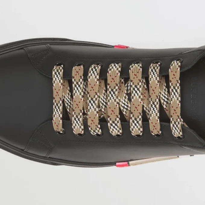 Lädersneakers med randiga detaljer Lädersneakers med randiga detaljer