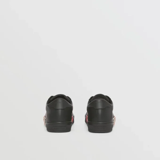 Lädersneakers med randiga detaljer Lädersneakers med randiga detaljer
