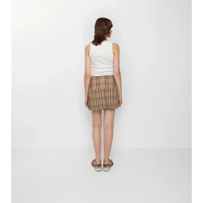 Plisserad minikilt i ull med rutmönster Plisserad minikilt i ull med rutmönster