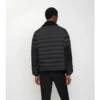 Pufferjacka i shearling och nylon Pufferjacka i shearling och nylon