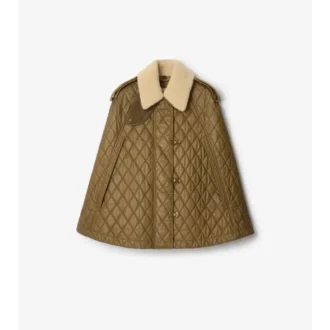 Quiltad bomullskappa med shearlingkrage Quiltad bomullskappa med shearlingkrage