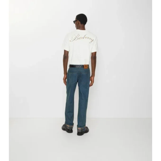 Raka jeans med uppvikt fåll och rutmönster Raka jeans med uppvikt fåll och rutmönster