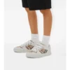 Sneakers i bomull och läder med rutmönster